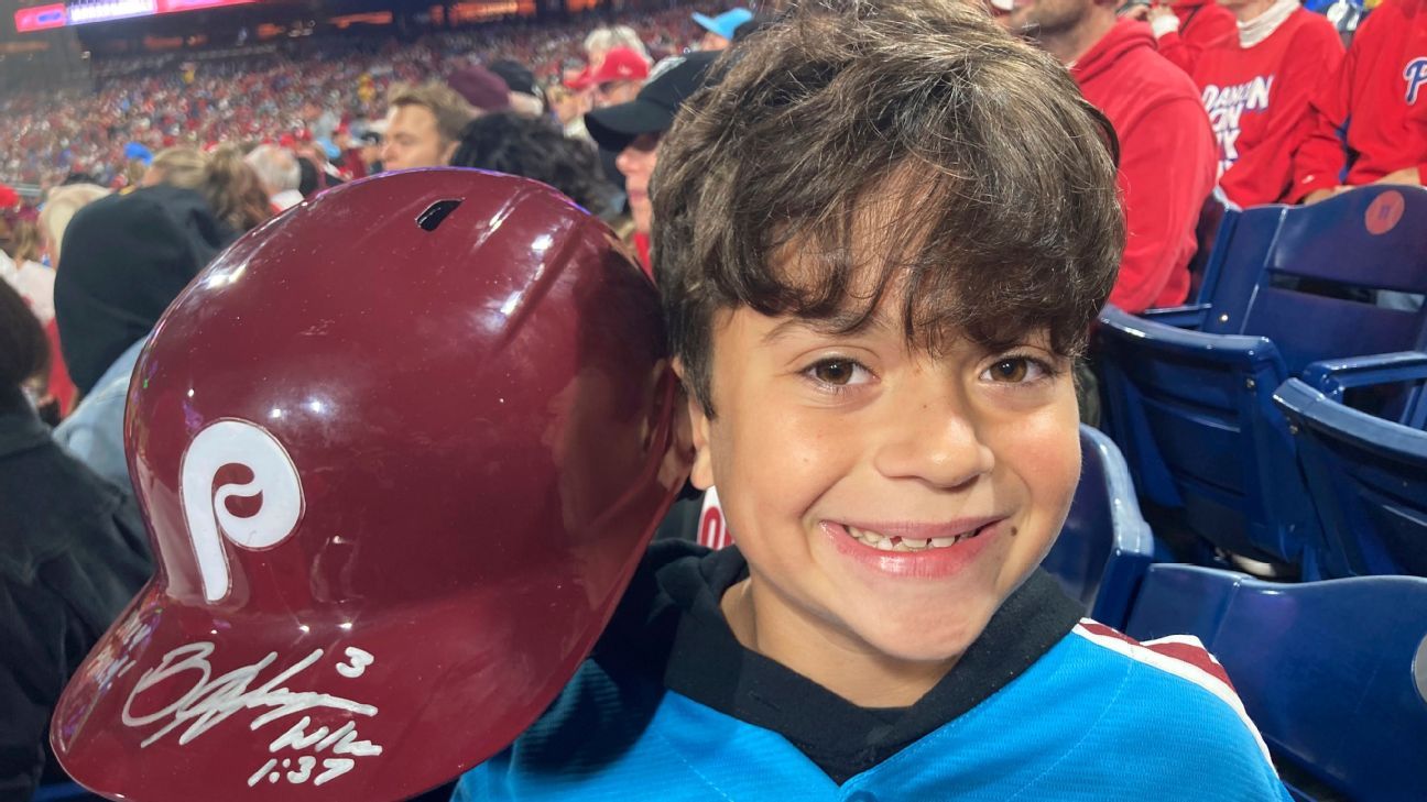 Phillies' Bryce Harper Signs His Helmet for a Young Fan After Being Ejected