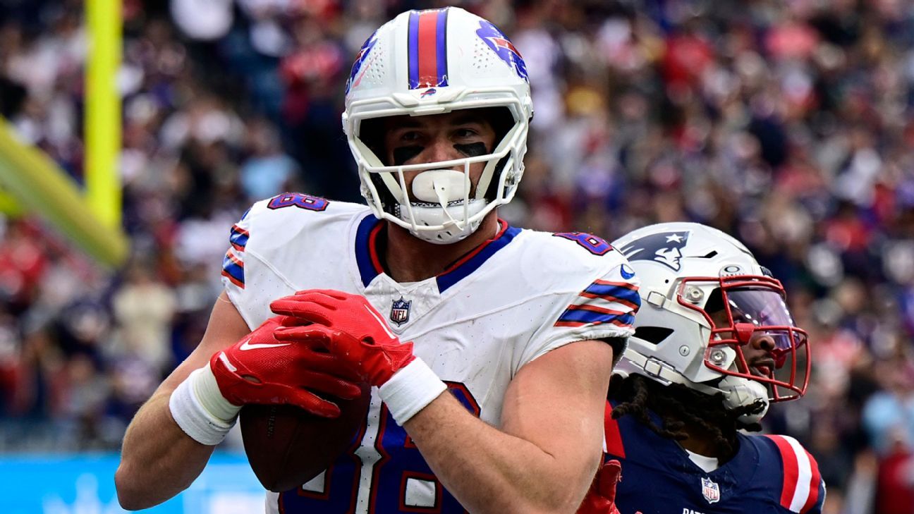Buffalo Bills tight end Dalton Kincaid reacts to quarterback Josh Allen  reaching out to him after being drafted by Bills