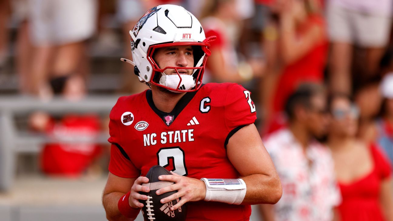 NC State QB Grayson McCall was carted off the field after a header hit