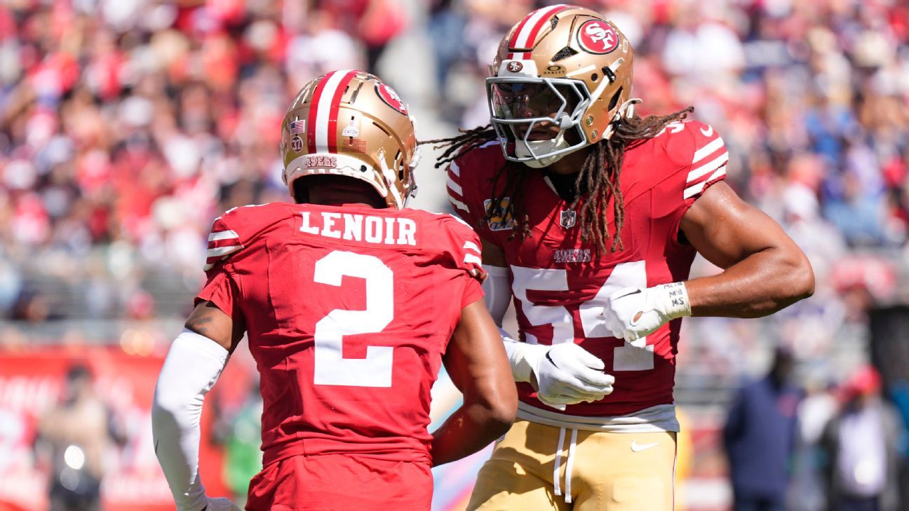 The 49ers’ Deommodore Lenoir recovers a blocked kick for a 61-yard TD