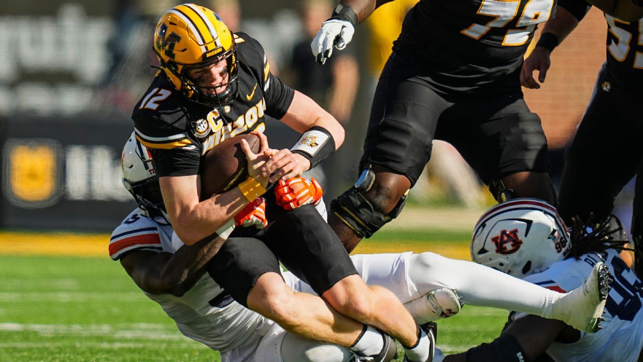 Brady Cook returns from the hospital and leads Missouri past Auburn