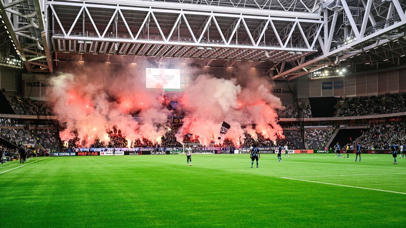 Swedish league game suspended after fans throw pyrotechnics onto the