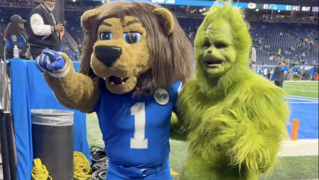 Fashion, football, and festivity: ‘The Grinch’ visits Ford Field with Lions’ mascot