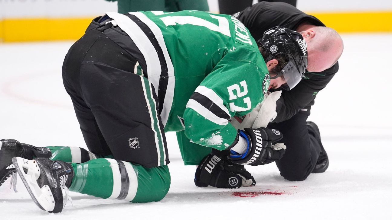 Stars' Marchment exits after taking puck to face
