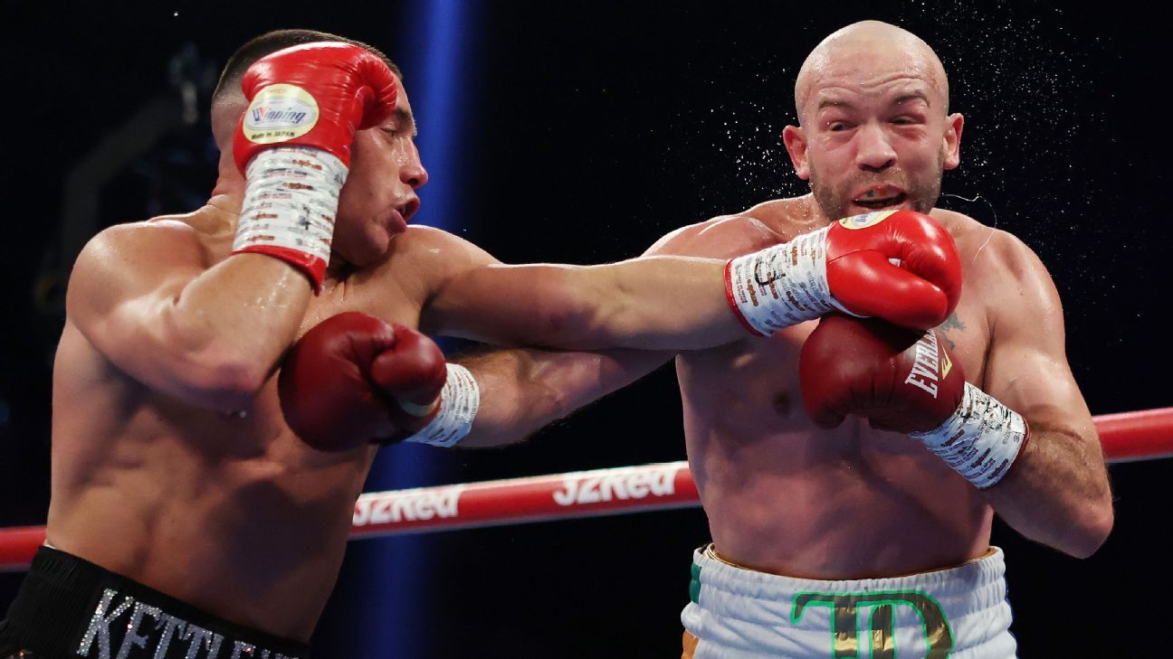 Ball retains featherweight title with 10th-rd. TKO