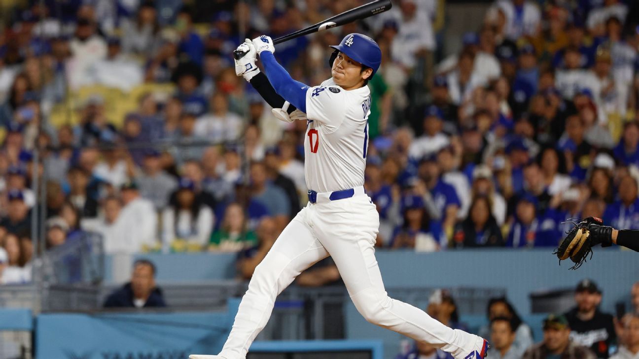 Ohtani marks bobblehead night with 2 HRs in rout