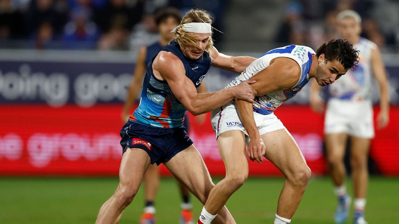 Smith shines as Cats survive Dogs' challenge in classic