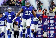 Lawrence absent from Giants workouts, but Harbaugh optimistic