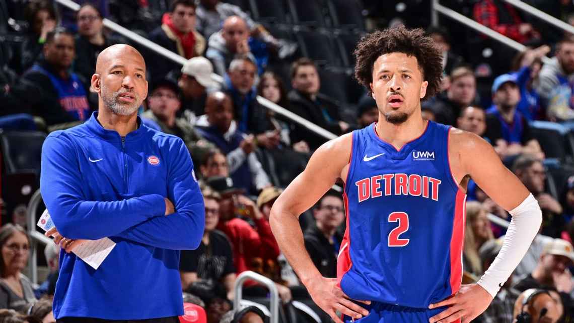 Monty Williams coaching on the sidelines for the Pistons.
