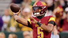 Commanders' Jayden Daniels practices, says status up to doctors