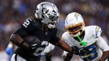 Why has the Raiders' running game failed to catch fire?