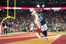 Cards' Harrison struggles early, rebounds with big 4th quarter
