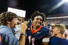 Virginia stuns No. 8 Florida State in 2OT as fans storm field