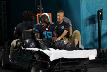Dolphins' Tyreek Hill carted off vs. Jets with knee injury