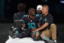 Source: Dolphins' Tyreek Hill carted off with suspected dislocated knee