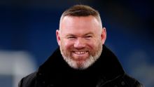 Wayne Rooney rows down river after losing bet at World Cup
