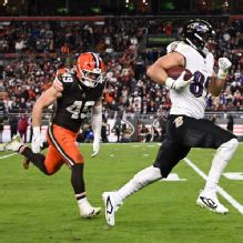 Andrews sets record, then seals Ravens' win with trick-play TD run