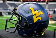 West Virginia assistant Devine arrested on strangulation charge