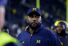 Ex-staffer says Michigan didn't protect her enough from Moore