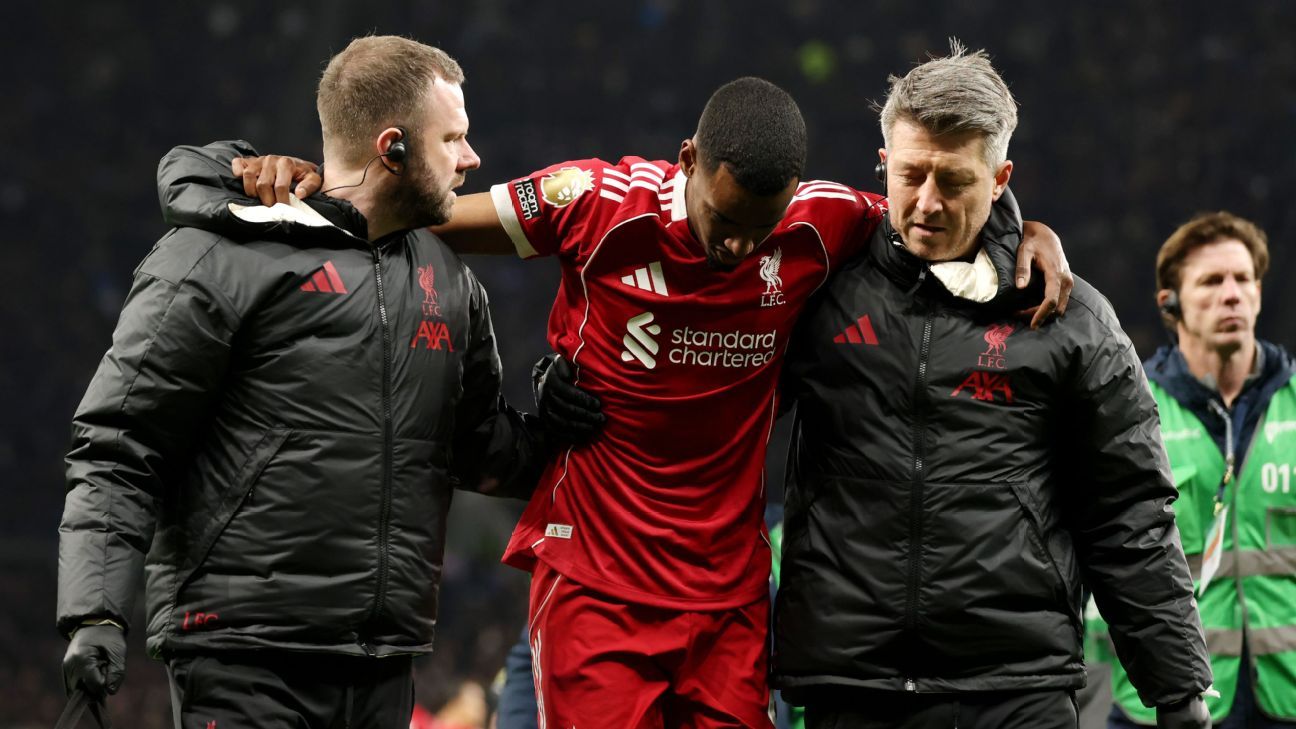 Liverpool hang on for narrow win against nine-man Tottenham: as it happened