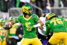 Oregon beats James Madison in College Football Playoff opener