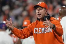 Clemson's Swinney says pursuit of NFL players 'embarrassing'