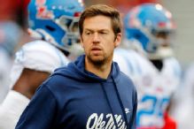 LSU's Weis with Ole Miss for game; has done 'terrific job'