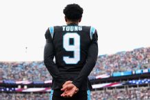 Panthers eye 'big picture,' pick up 5th-year option on QB Young