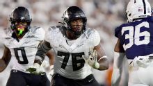 Source: Ducks' Isaiah World to miss NFL combine with torn ACL