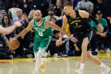 Porzingis rusty, but provides spark in 12-point Warriors debut