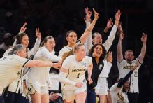 Olivia Olson's 19 lead Michigan past Louisville into Elite 8