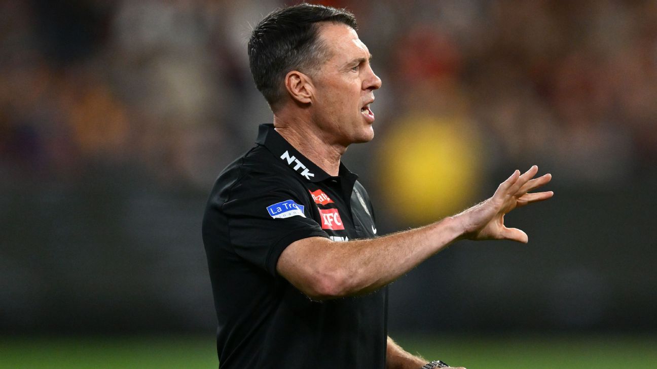 Nick Daicos looking dejected on the sidelines