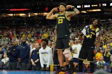 Lendeborg vows to play in NCAA final despite MCL, ankle sprains