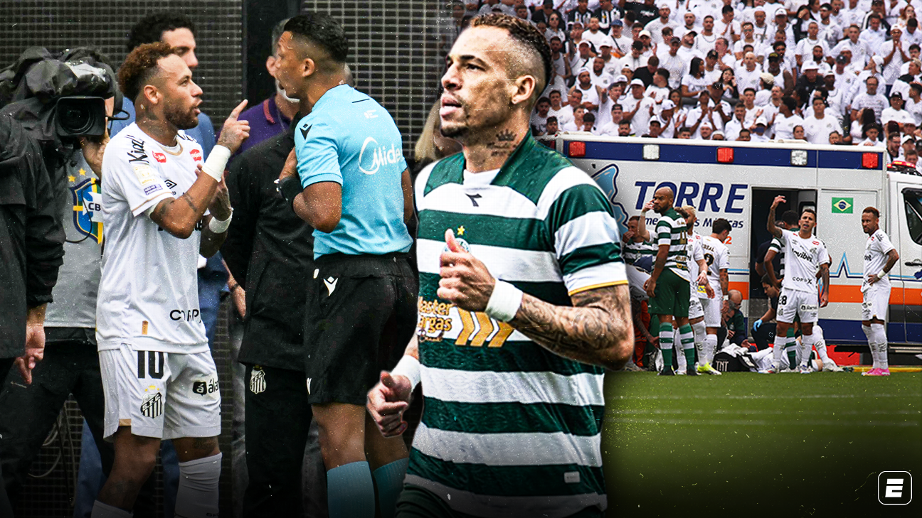 Coritiba players celebrate a goal against Santos with stadium lights in the background