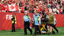 Canada's Ismaël Koné stretchered off after hard tackle