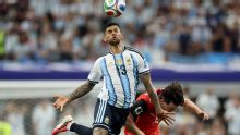 Argentina coach Scaloni awaits tests to learn extent of Cristian Romero knee injury