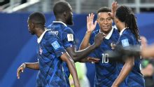 Kylian Mbappé makes it rain as storms delay France win