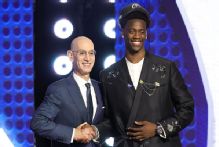 AJ Dybantsa unveils No. 4 jersey with Wizards upon arrival in D.C.