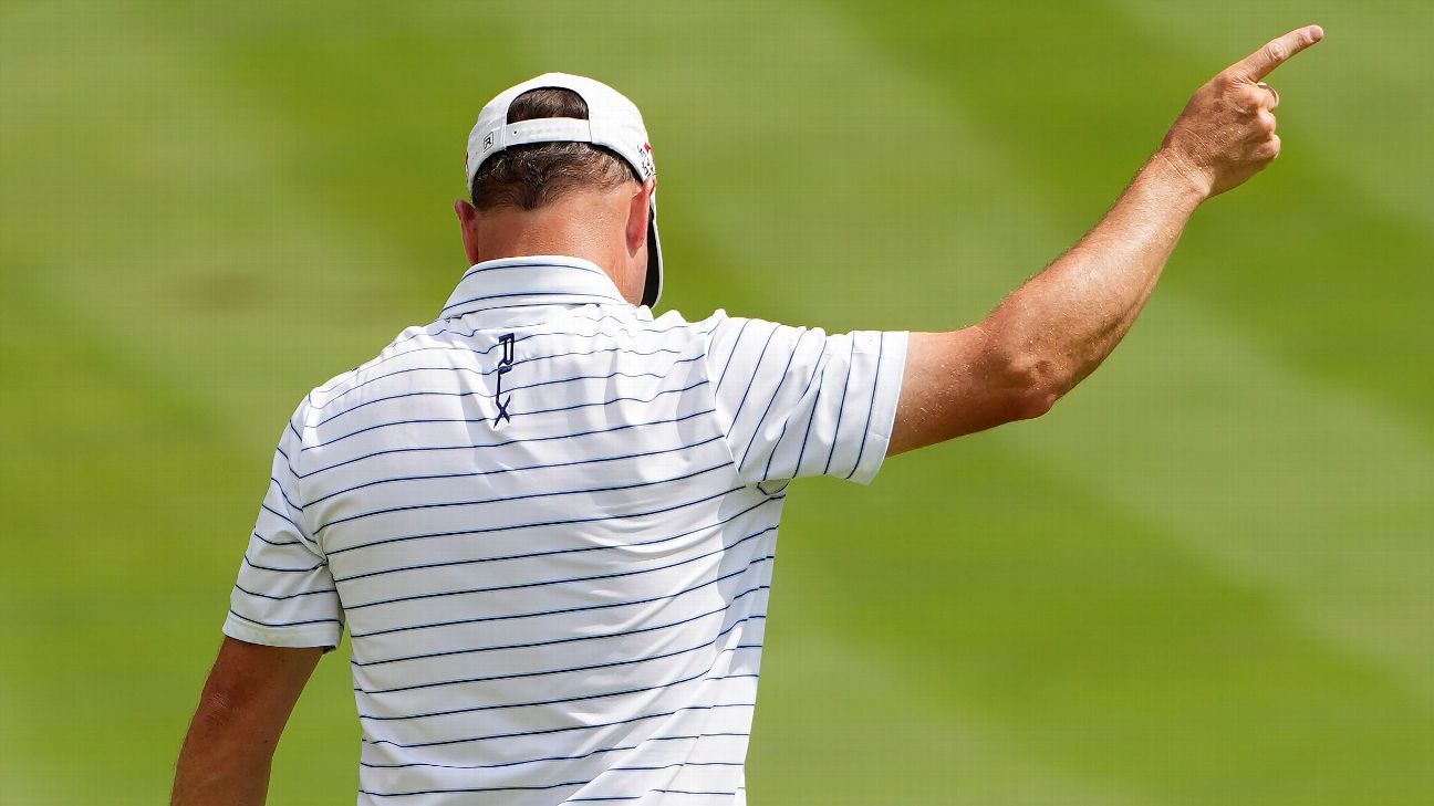 Johnson wins in Akron for 1st Champions major title