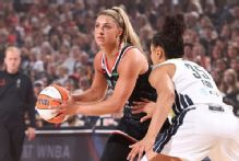 Fire guard Barker helped off floor with leg injury vs. Wings