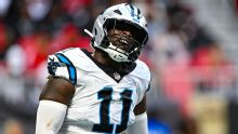 Panthers' Scourton carted off with knee injury on 1st day of camp