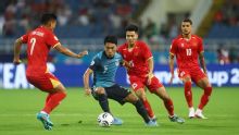 Singapore grind out draw in Vietnam to stay top of Group A in ASEAN Championship