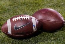 Judge says injunction doesn't cover football players who signed pro deals