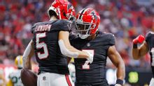 Falcons extend Robinson, offensive core, put spotlight on QB