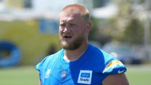 Chargers' Tyler Biadasz carted off with left leg injury