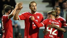 Kane double helps Bayern overcome early scare in German Cup