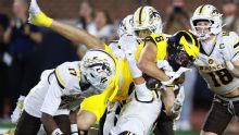 Michigan falls out of AP Top 25 college football poll after win