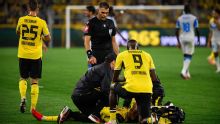 Borussia Dortmund teenager Karetsas hospitalised after slumping to turf in Champions League