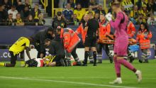 Jogador do Dortmund dá susto em partida da Champions e passará por exames: 'Não conseguia falar'