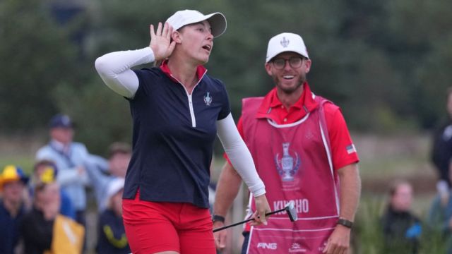 Jennifer Kupcho celebrates after sinking a second straight long putt to win her match and even the Solheim Cup.